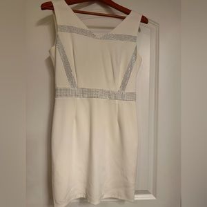 Sleeveless dress with stone detailing